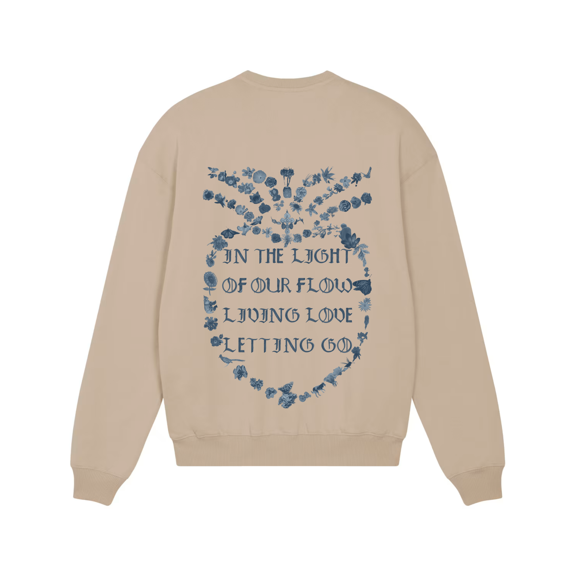 A beige crewneck sweatshirt shown from the back, featuring a blue graphic print of a floral heart with the text 'IN THE LIGHT OF OUR FLOW LIVING LOVE LETTING GO'.