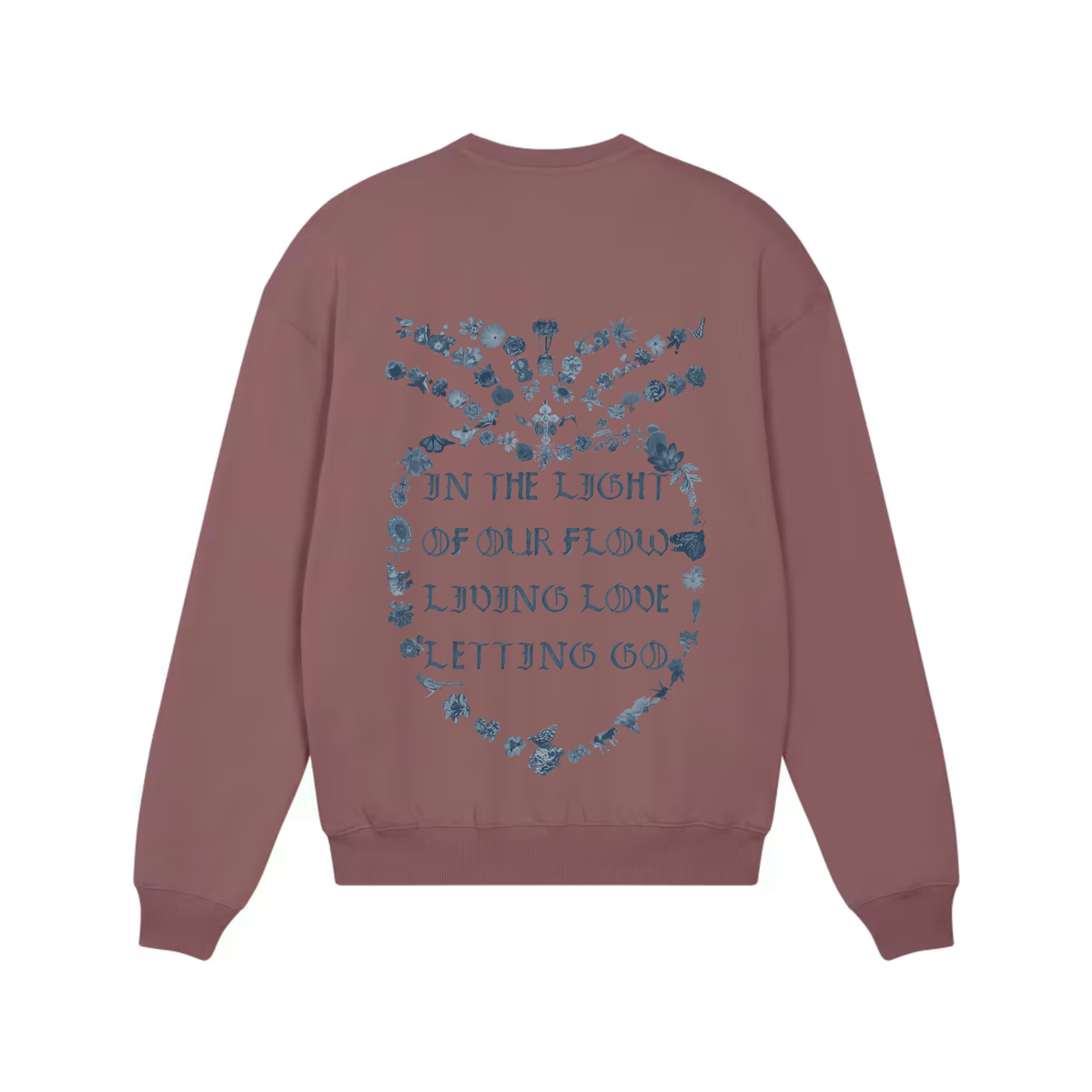 A dusty rose crewneck sweatshirt shown from the back, featuring a blue graphic print of a floral heart with the text 'IN THE LIGHT OF OUR FLOW LIVING LOVE LETTING GO'.