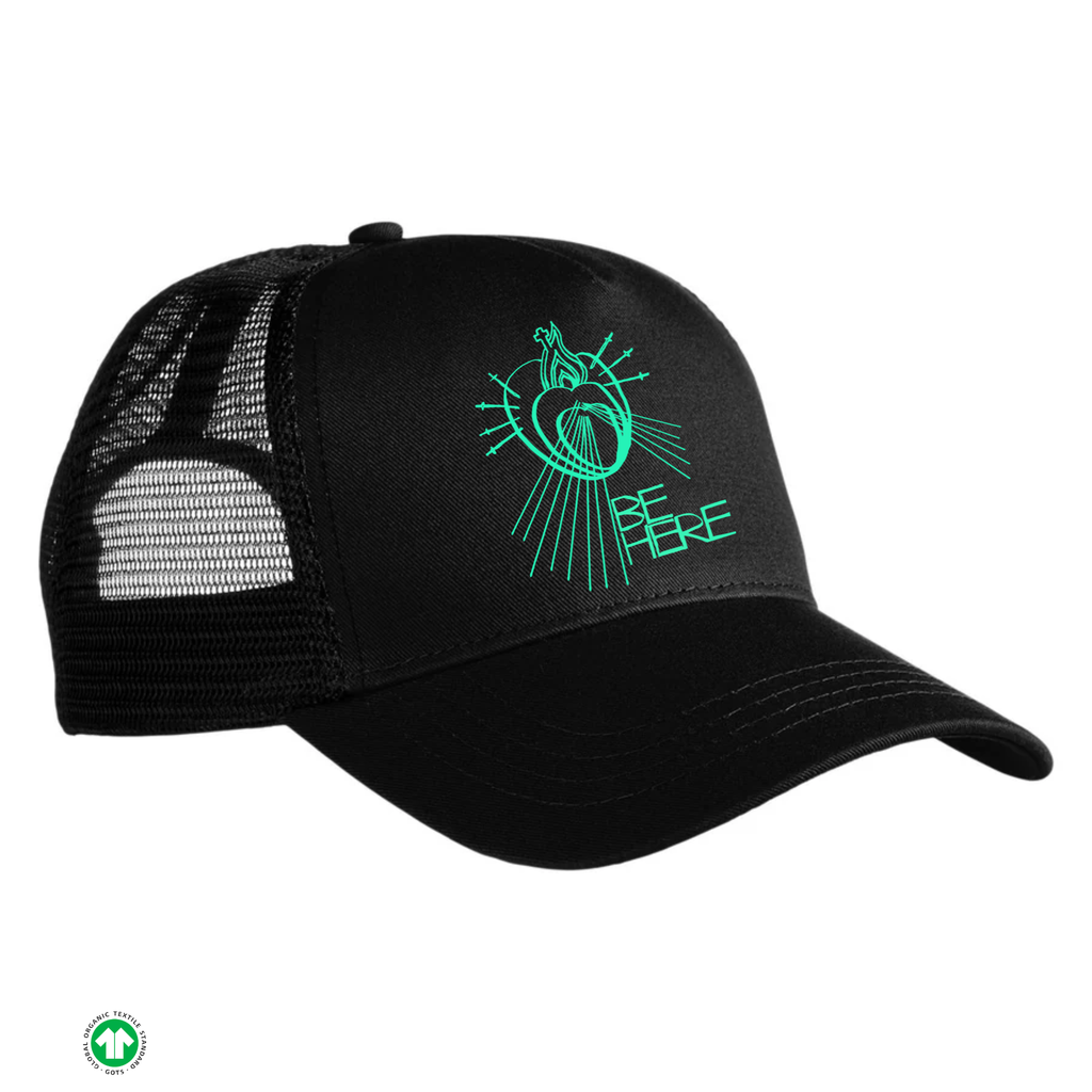 Black cap with green logo and text on a white background