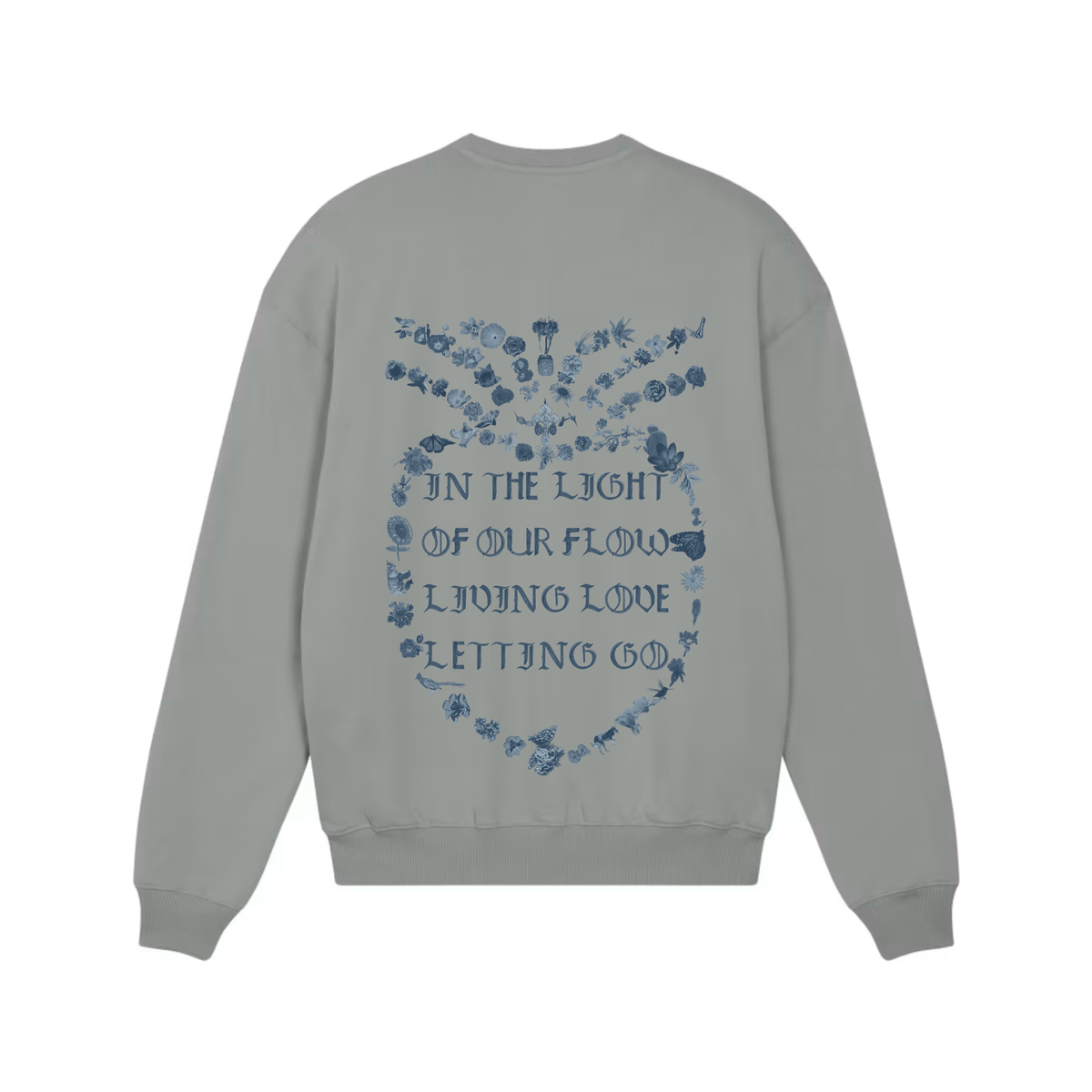 A misty gray crewneck sweatshirt shown from the back, featuring a blue graphic print of a floral heart with the text 'IN THE LIGHT OF OUR FLOW LIVING LOVE LETTING GO'.
