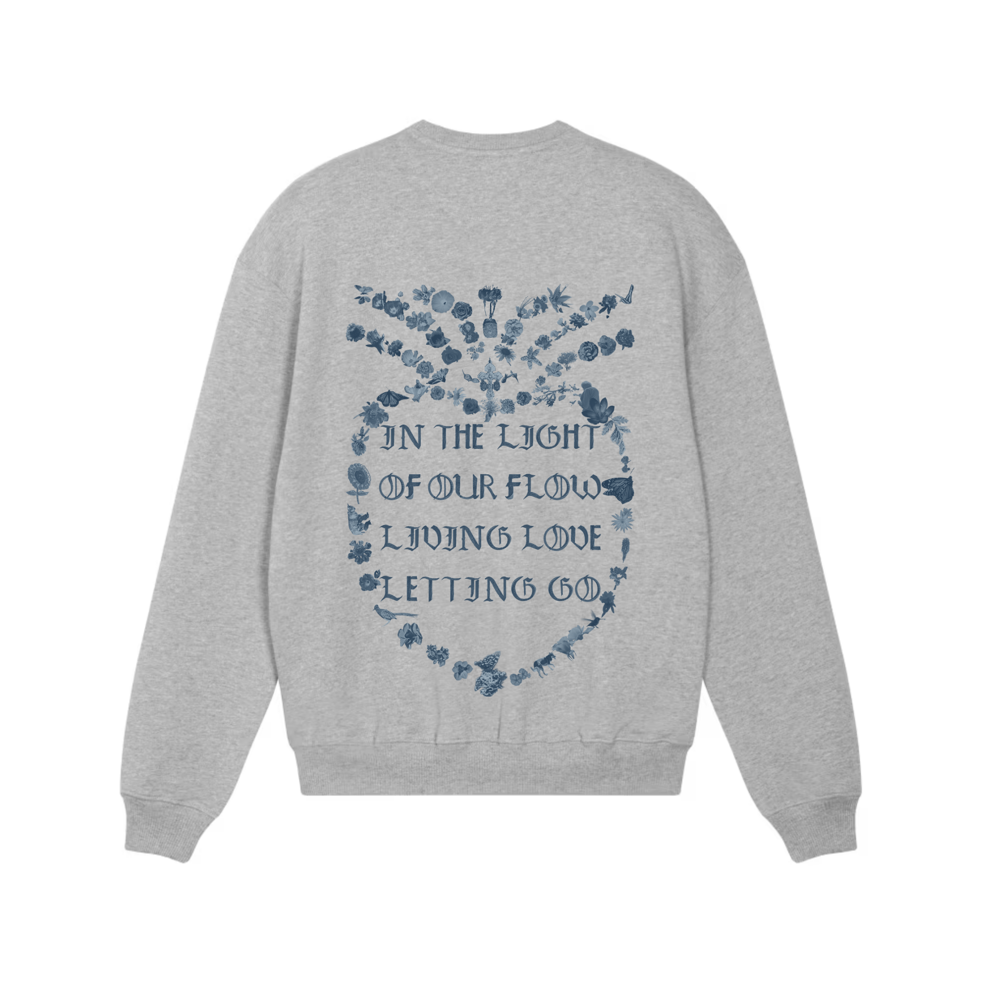 An heather gray crewneck sweatshirt shown from the back, featuring a blue graphic print of a floral heart with the text 'IN THE LIGHT OF OUR FLOW LIVING LOVE LETTING GO'.